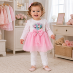 Baby girl wearing pink Mama bow frock top with white pajama