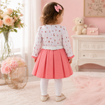 Back view of coral pink baby girls frock suit with white pajama and belt